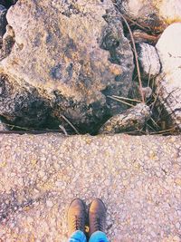 Low section of person standing on ground