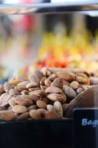 Close-up of almonds in display cabinet at shop