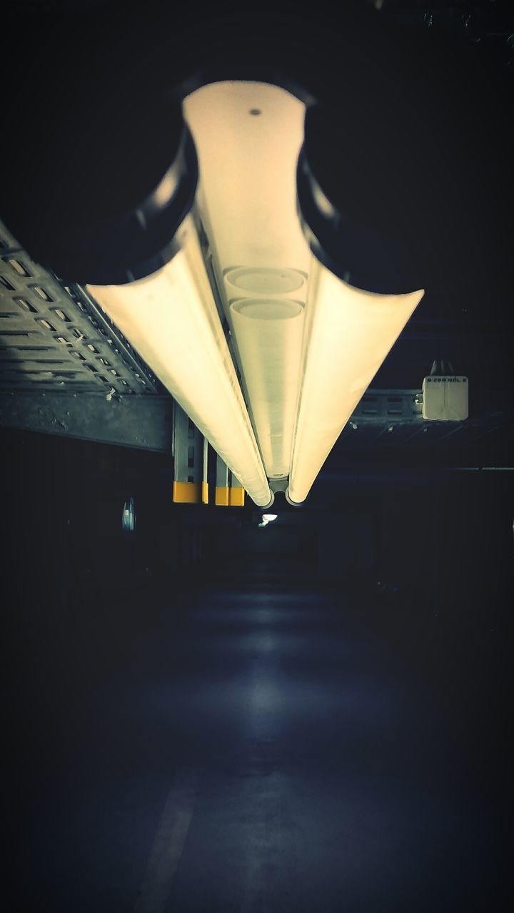 illuminated, indoors, lighting equipment, the way forward, architecture, night, built structure, ceiling, empty, diminishing perspective, transportation, light - natural phenomenon, electric light, corridor, tunnel, absence, dark, vanishing point, building, no people