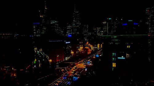 High angle view of illuminated city at night