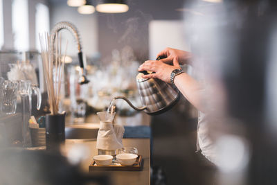 Man holding coffee cup