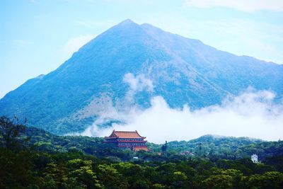 View of temple against mountain range