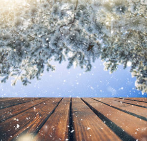 Snow covered field against sky