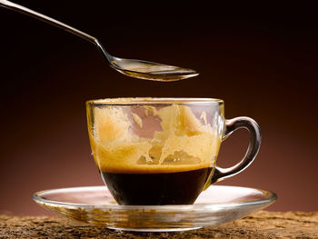 Close-up of coffee cup on table