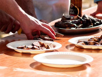 Midsection of person preparing food