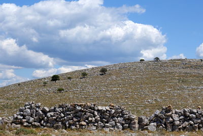 Scenic view of rocks against sky