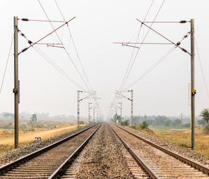 Railroad tracks against sky