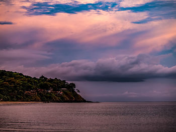 Scenic view of sea against sky at sunset