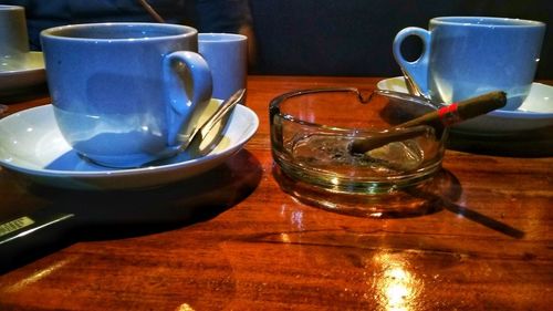 Close-up of coffee cup on table