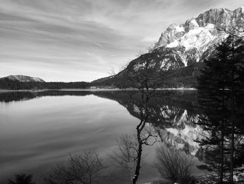 Scenic view of lake with mountains in background