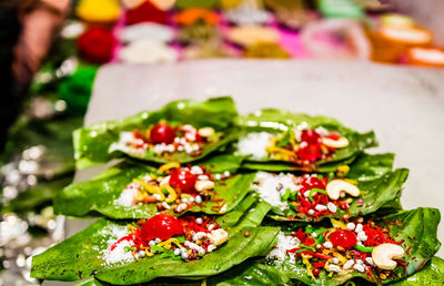 Close-up of chopped fruits in plate on table