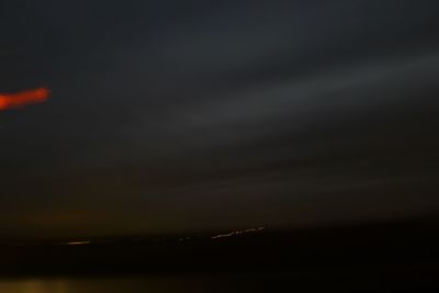 Scenic view of landscape against sky at sunset