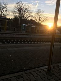 View of railroad tracks at sunset