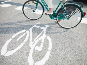 High angle view of bicycle parked on road