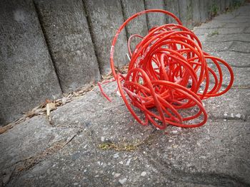 High angle view of red paint on floor