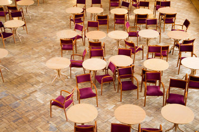 High angle view of empty chairs and table