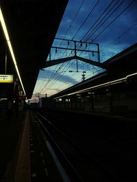 Railroad station platform at night