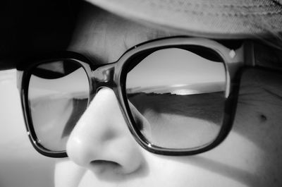 Reflection of sunglasses on mirror