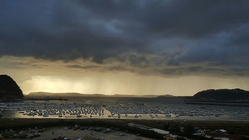 Scenic view of sea against cloudy sky