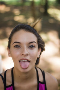 Close-up portrait of a smiling young woman