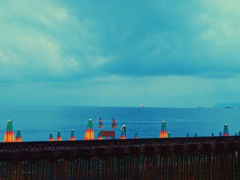 Scenic view of sea against blue sky