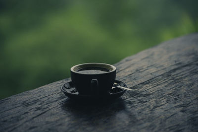 Close-up of coffee cup on table