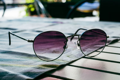 Close-up of sunglasses on table