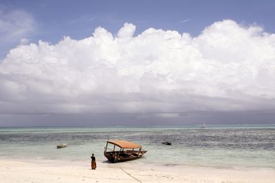 Scenic view of sea against cloudy sky