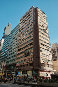 Low angle view of modern buildings against sky