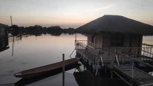 Scenic view of lake against sky during sunset