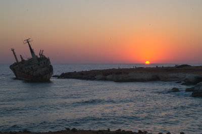 Scenic view of sea against sky during sunset