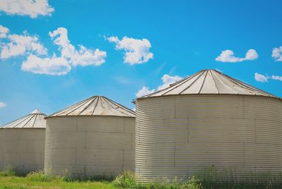 Low angle view of building against blue sky