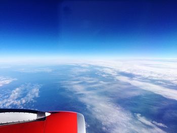 Cropped image of airplane on landscape