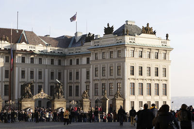 People in front of building