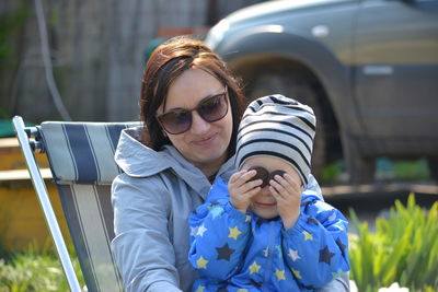 Mother and boy outdoors