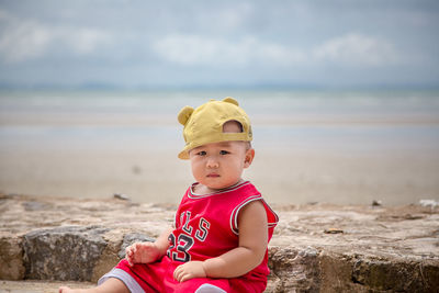 Portrait of cute boy on beach