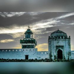 View of building against cloudy sky