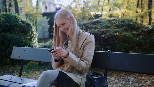 Young woman using mobile phone