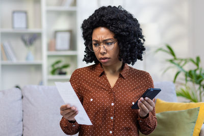 Young woman using mobile phone