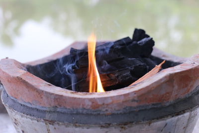 Making a fire in a brazier