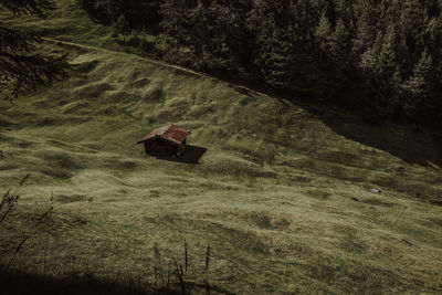 High angle view of house on grassy field