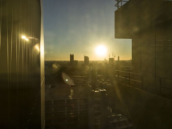 Cityscape against sky during sunset