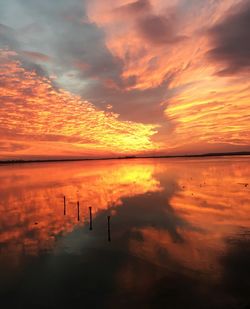 Scenic view of sea against dramatic sky