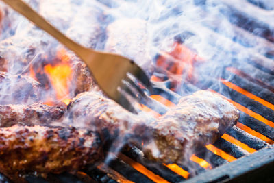 Close-up of meat on barbecue grill