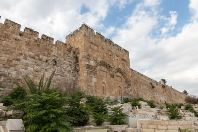 Low angle view of historical building against sky