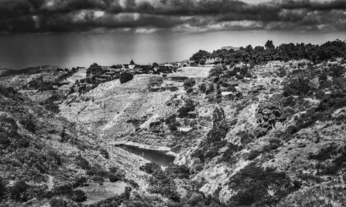 Scenic view of rocky mountains against sky