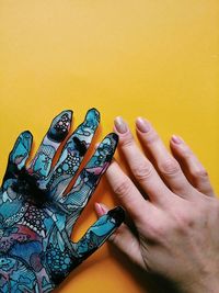 Close-up of woman hand with tattoo