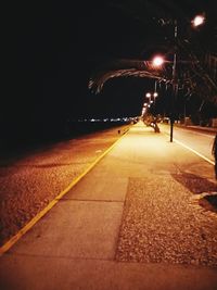 Illuminated street lights at night