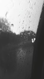 Close-up of water drops on glass