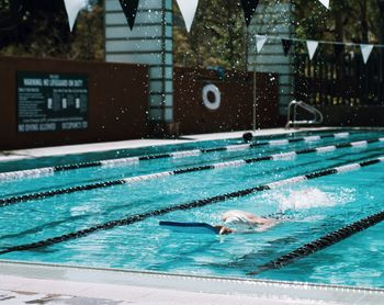 People swimming in pool